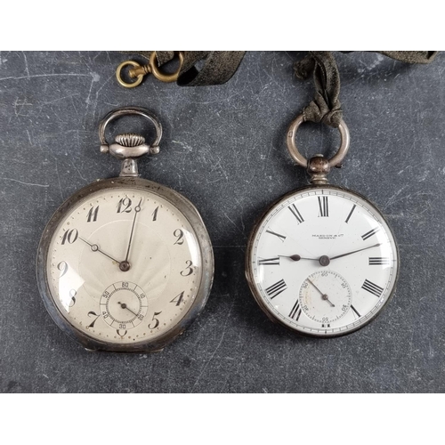 593 - A Swiss white metal stem wind open face pocket watch, stamped .875, 49mm, the dustcover inscribed H ... 