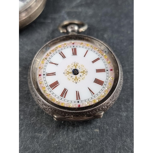 595 - A Swiss silver plated stem wind hunter pocket watch, by Roskopf, 38mm; together with a .935 key wind... 