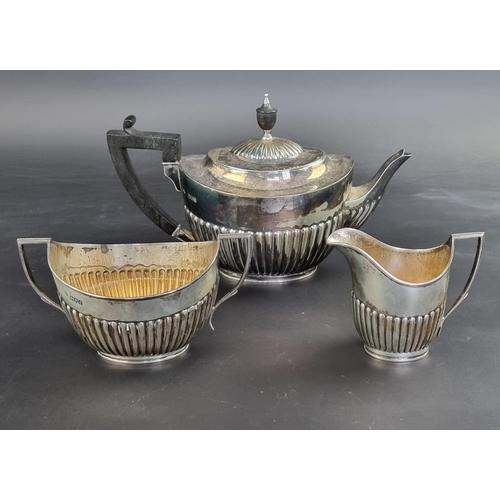 6 - A Victorian silver three piece tea set, by William Hutton & Sons Ltd, London 1899, teapot 16cm h... 