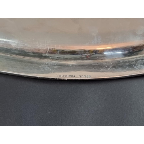 60 - A large German white metal serving dish, stamped '800', 55cm wide.