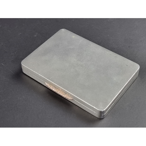 65 - An engine turned silver cigarette case, by W H Manton Ltd, Birmingham 1946, 8cm wide, 98g.... 