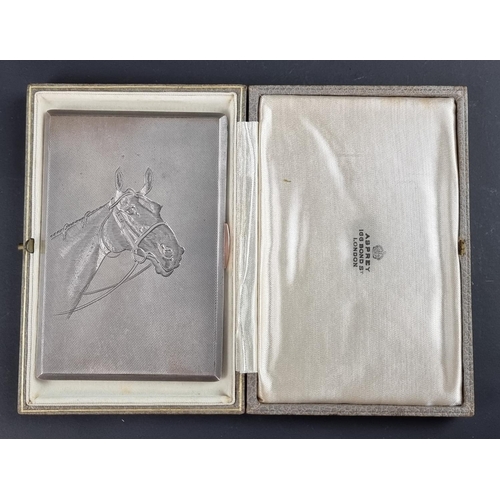 67 - A silver engine turned cigarette case, engraved horse's head, by A Wilcox, Birmingham 1938, in Aspre... 