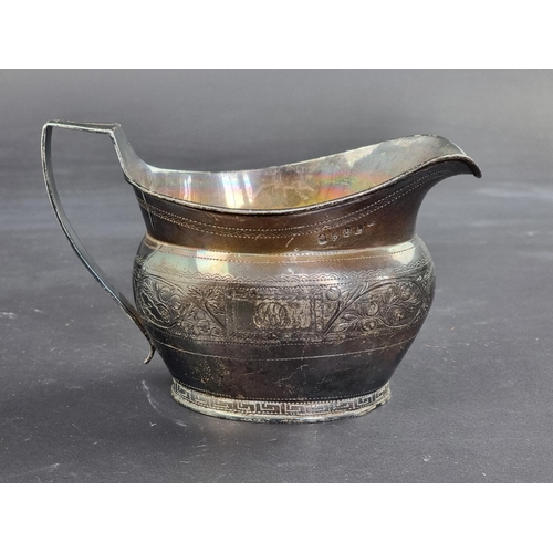 68 - An Irish George III silver jug, maker's mark rubbed, Dublin 1807, height to handle 10.5cm, 198g.... 