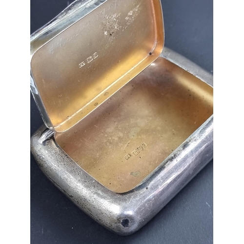 69 - An Edwardian silver tobacco box, probably by Colen Hewer Cheshire, Chester 1906, 9.5cm wide, 119g.... 