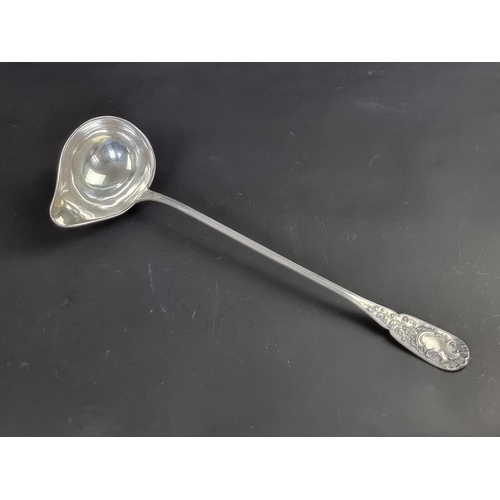 71 - A German white metal ladle, stamped '800'.