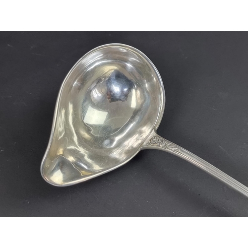 71 - A German white metal ladle, stamped '800'.