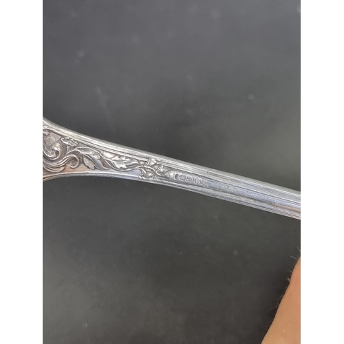 71 - A German white metal ladle, stamped '800'.