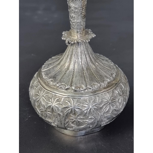 77 - An Eastern white metal rosewater bottle, 19.5cm high; together with an Eastern white metal plated va... 