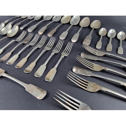 78 - A matched part canteen of silver fiddle pattern cutlery, different makers and dates, 1773g. (35)... 