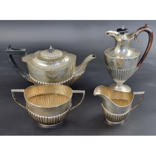 8 - An Edwardian silver three piece tea set, by Williams Ltd, Birmingham 1903/4, teapot height to handle... 