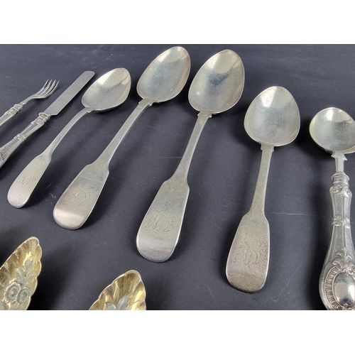 87 - A quantity of silver cutlery; together with three pieces of silver handled cutlery, 418g weighable.... 