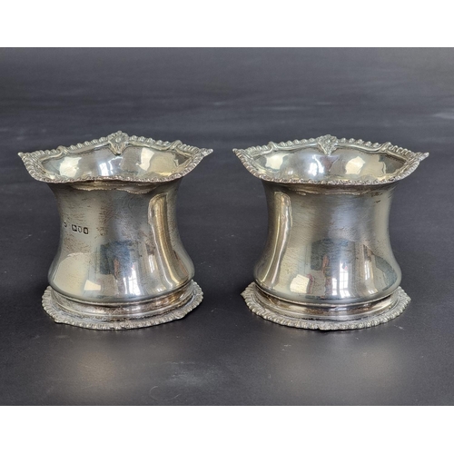 9 - A pair of Edwardian silver vases, by William Comyns & Sons, London 1901/2, 7.5cm high, 296g.... 