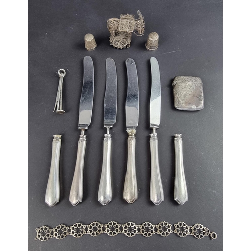 91 - A group of silver, silver mounted and metal items, gross weighable 39g.