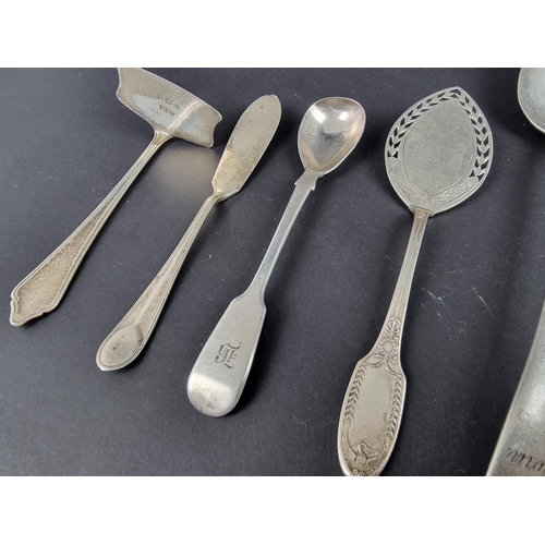 92 - Eight various pieces of silver cutlery, 204g; together with a white metal slice. (9)... 