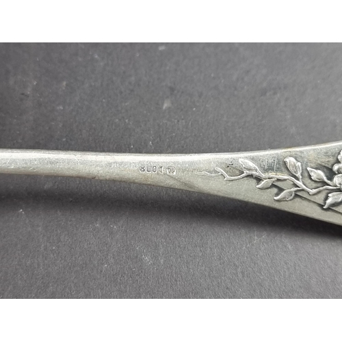 94 - A German white metal fork and matching spoon, stamped '800'. (2)