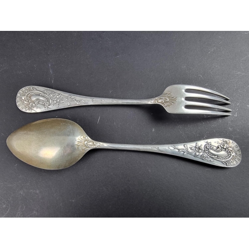 94 - A German white metal fork and matching spoon, stamped '800'. (2)