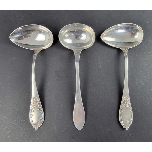 95 - Three German white metal ladles, stamped '800'.