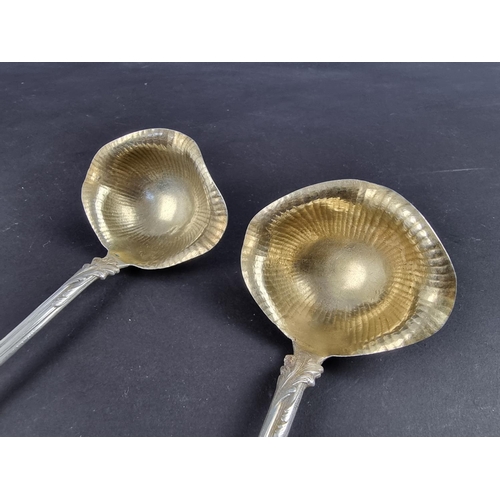 97 - Two German white metal sauce ladles, stamped '800'.