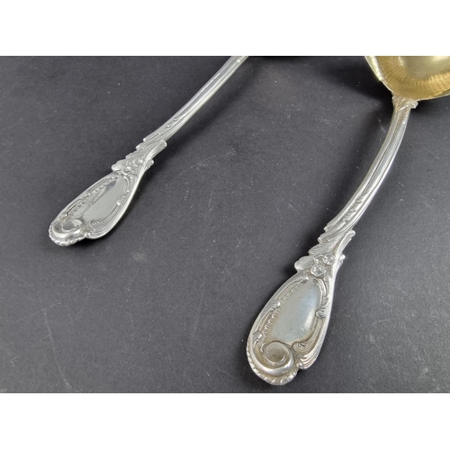 97 - Two German white metal sauce ladles, stamped '800'.