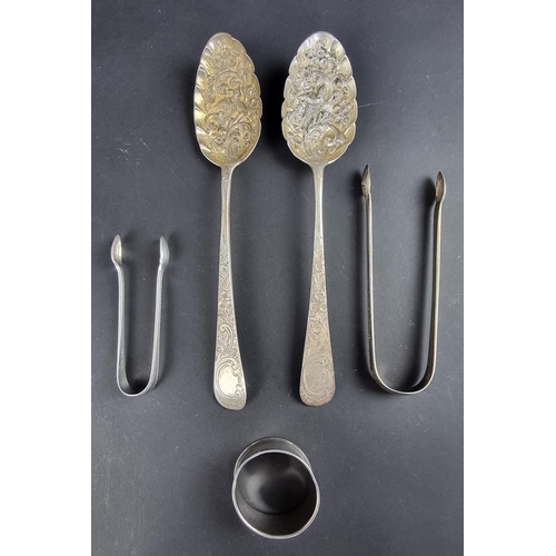 98 - A pair of late Victorian silver spoons, by I S, London 1901; together with two pairs of silver sugar... 