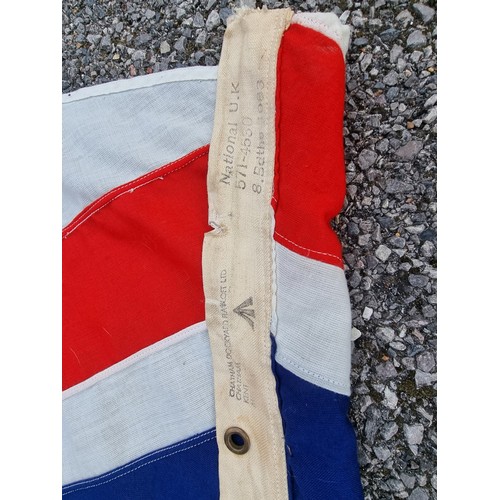 1800 - A large Union Flag, inscribed 'Chatham Dockyard Flag Loft Ltd', broad arrow and 571-4580, 8.Bdths 19... 