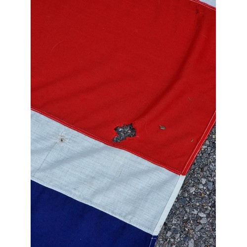 1800 - A large Union Flag, inscribed 'Chatham Dockyard Flag Loft Ltd', broad arrow and 571-4580, 8.Bdths 19... 