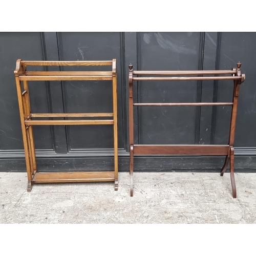 1024 - An Edwardian mahogany towel rail, 77cm wide; together with another beech example, 69cm wide. (2)... 