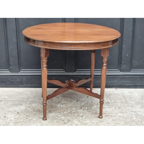 1027 - An early 20th century mahogany circular table, 84cm diameter.