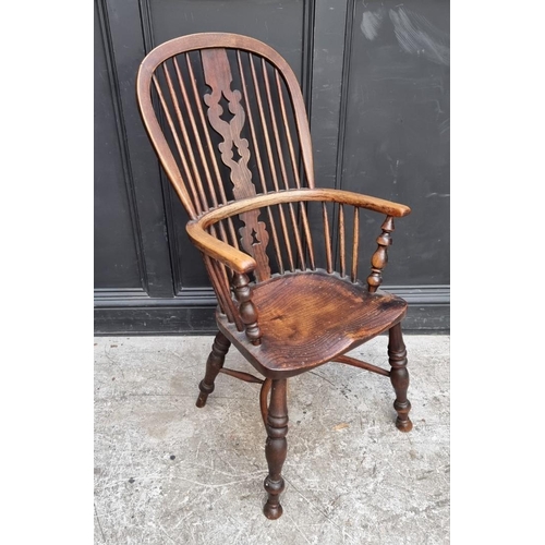 1069 - A Victorian ash, beech and elm Windsor armchair.