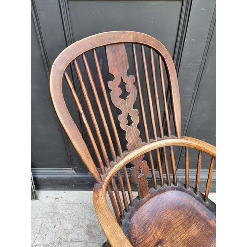 1069 - A Victorian ash, beech and elm Windsor armchair.