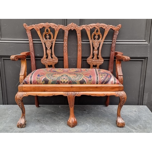 1074 - A child's 18th century style carved mahogany chair back settee, 73.5cm wide.