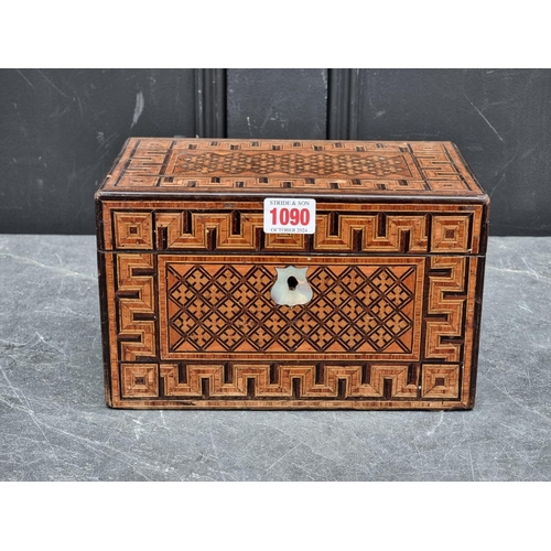 1090 - A Victorian parquetry tea caddy, 24.5cm wide.