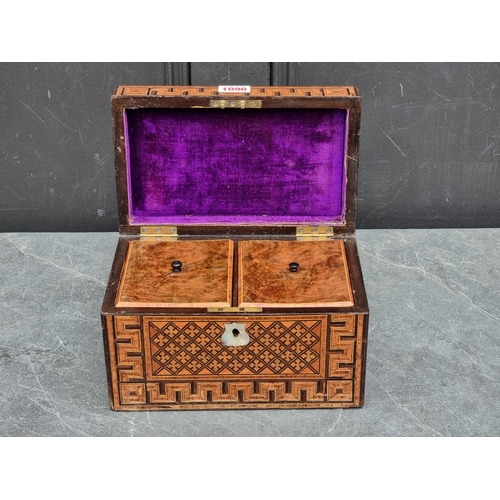 1090 - A Victorian parquetry tea caddy, 24.5cm wide.