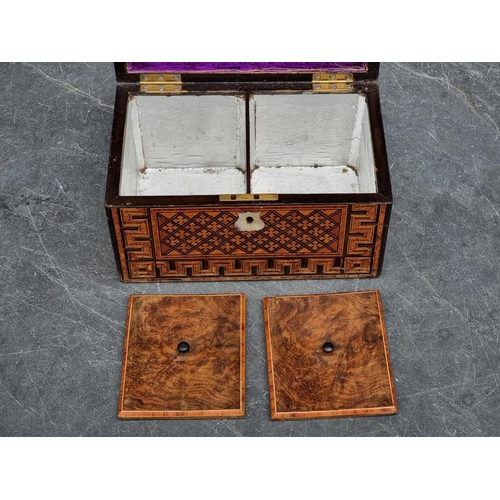 1090 - A Victorian parquetry tea caddy, 24.5cm wide.