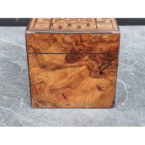 1090 - A Victorian parquetry tea caddy, 24.5cm wide.