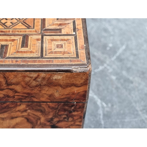 1090 - A Victorian parquetry tea caddy, 24.5cm wide.