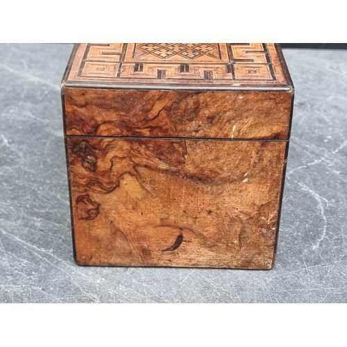 1090 - A Victorian parquetry tea caddy, 24.5cm wide.