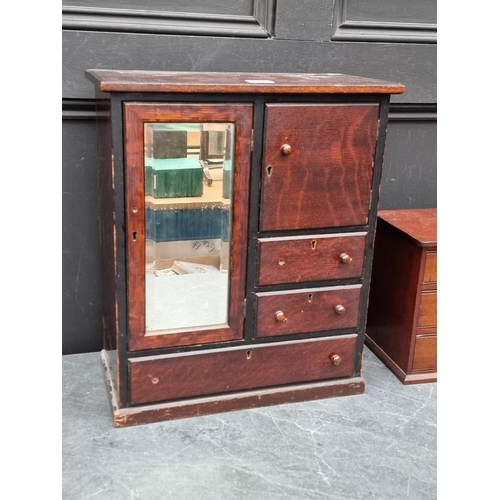 1097 - An unusual early 20th century miniature oak wardrobe, 44.5cm high x 37.5cm wide; together with ... 