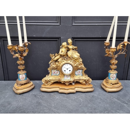 1126 - A matched 19th century gilt brass and Sevres style clock garniture, the clock 35.5cm high, the pair ... 