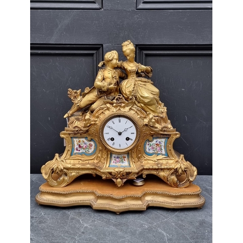 1126 - A matched 19th century gilt brass and Sevres style clock garniture, the clock 35.5cm high, the pair ... 