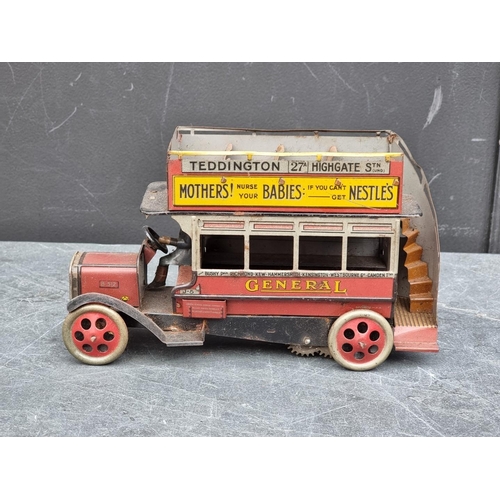 1507 - A rare circa 1920s Burnett clockwork tinplate B type 'General' Omnibus, 22.5cm long, (lacking one fr... 