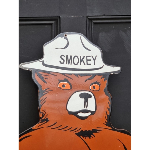 1744 - A Canadian enamel 'Smoky' Bear sign, 122.5 x 57.5cm.