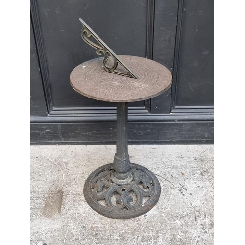 1776 - A steel sundial, 71cm high.