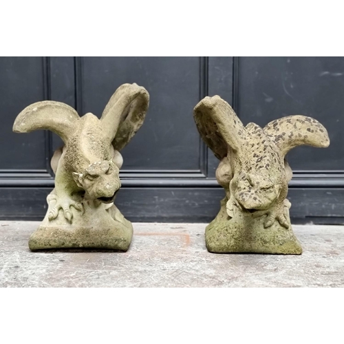 1777 - A pair of old weathered composition stone grotesque gryphon gate pier finials, 50cm high.... 