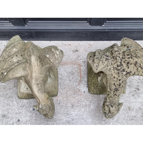 1777 - A pair of old weathered composition stone grotesque gryphon gate pier finials, 50cm high.... 