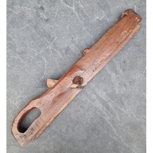 1778 - An unusual antique French walnut carpenter's plane, 67cm long. 