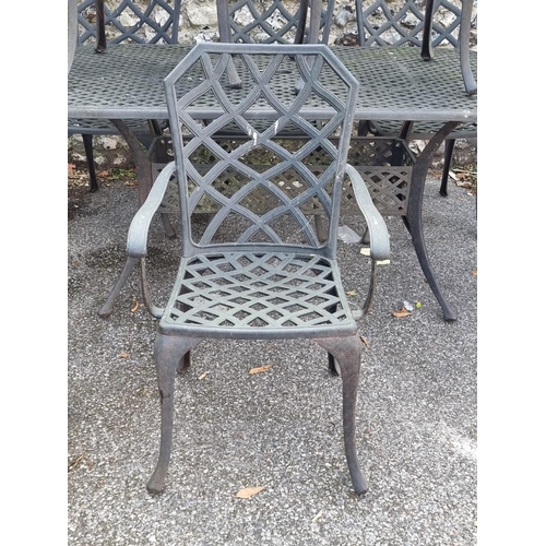 1823 - An aluminium garden table and six chairs, the table 159cm wide.