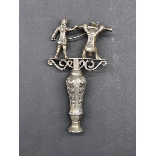 1630 - An unusual 19th century Dutch silver pocket corkscrew, 8.5cm high.