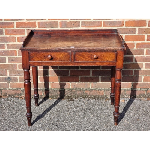 1058 - An early Victorian mahogany washstand, 89cm wide.