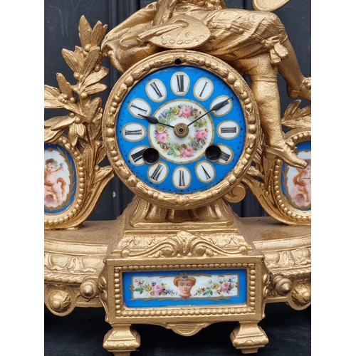 1110A - A late 19th century gilt spelter and Sevres style mantel clock, 32cm high, (with later battery ... 